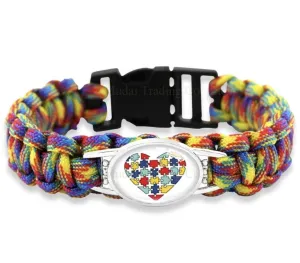 Bracelet { Autism } Rainbow colors. Heart. Puzzle pieces. Paracord. 8.7 inches.