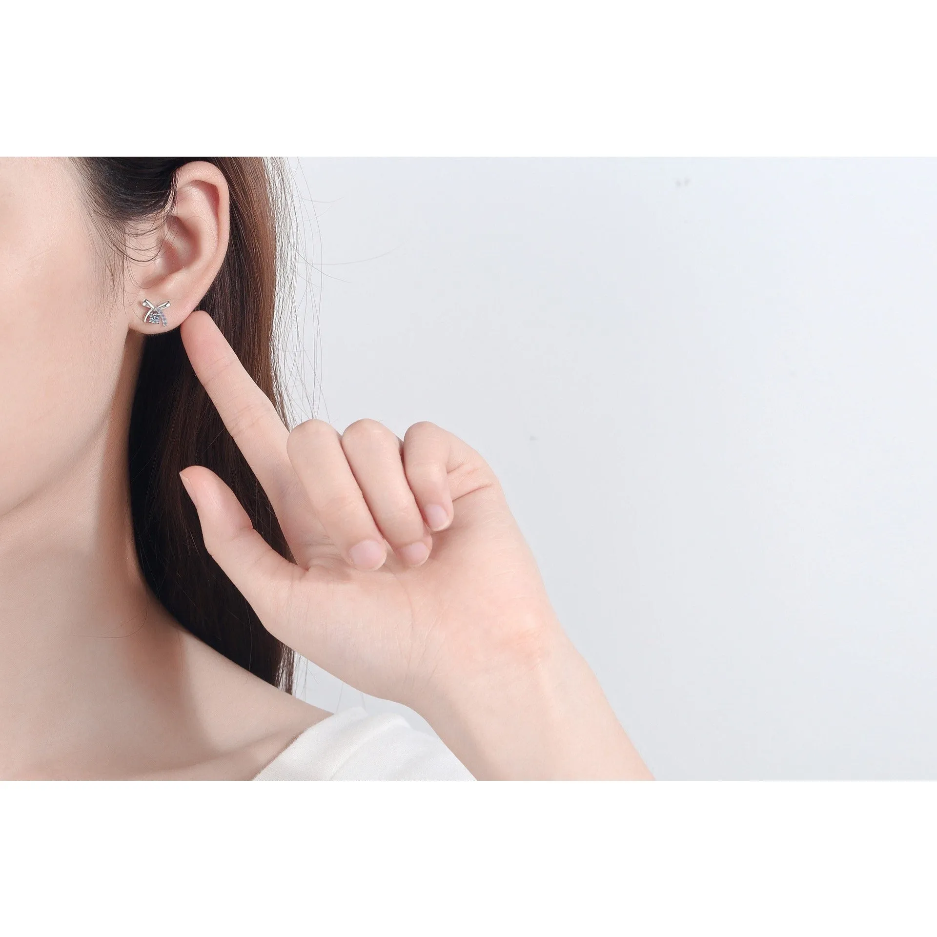 Moissanite Diamonds Studs Earrings; Miniature bow shape studs - EM029