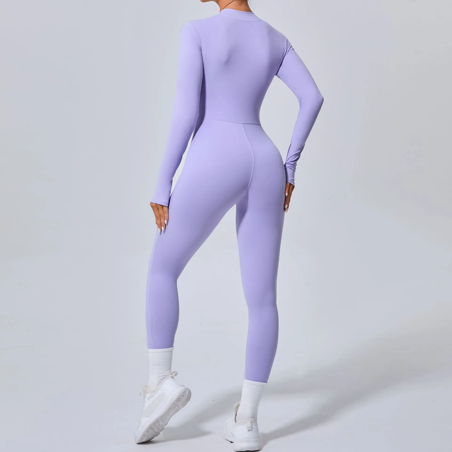 Sleek Solid Color Long Sleeve Half-Zip Yoga Jumpsuit for Active Style