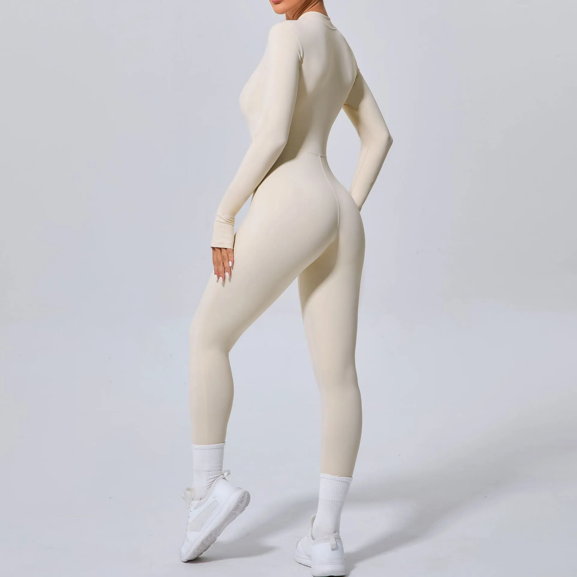 Sleek Solid Color Long Sleeve Half-Zip Yoga Jumpsuit for Active Style