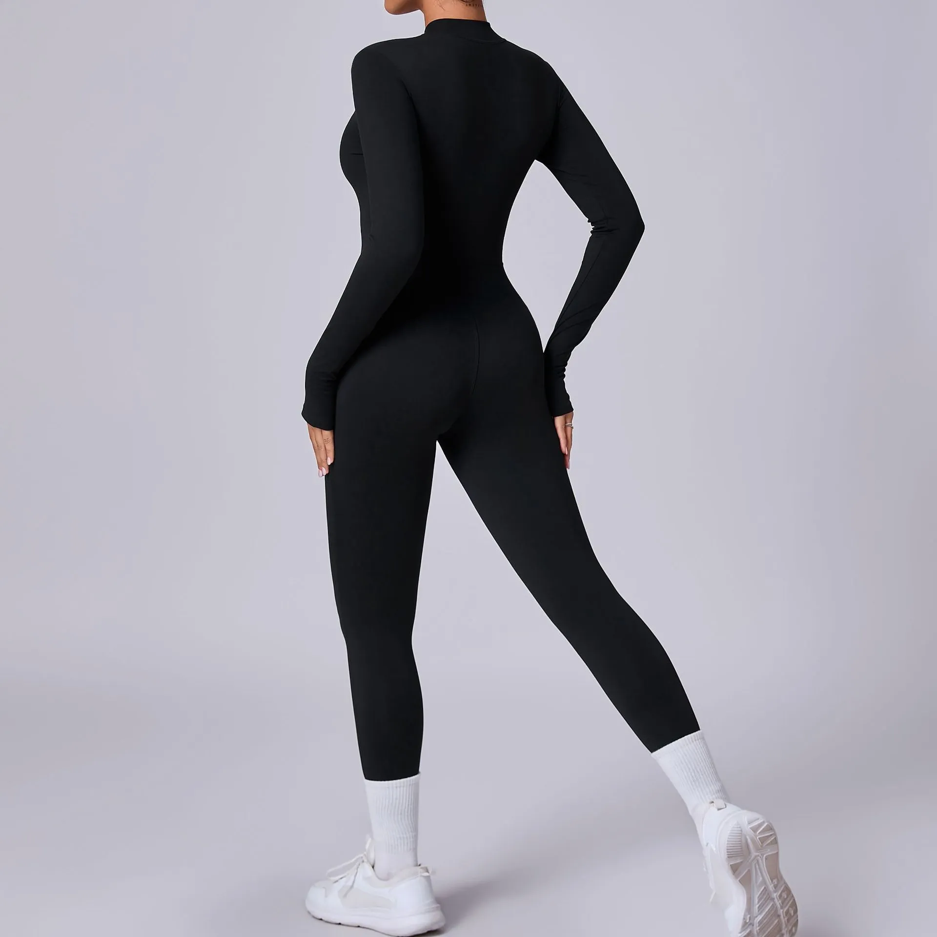 Sleek Solid Color Long Sleeve Half-Zip Yoga Jumpsuit for Active Style